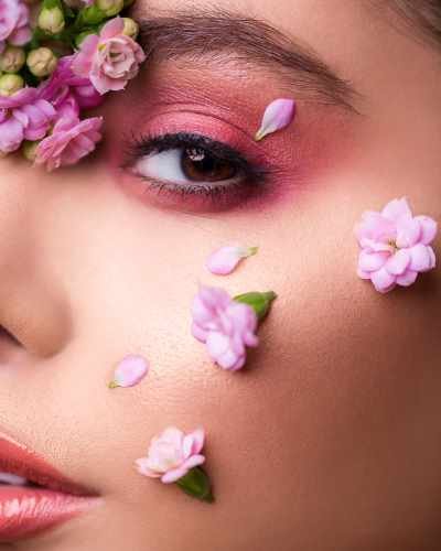 female-model-with-flowers-her-face